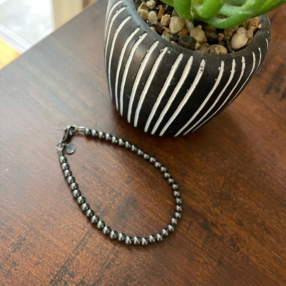 Never Worn Black hematite beaded bracelet .925 Sterling Silver.